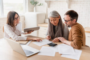 agent consulting with adult couple
