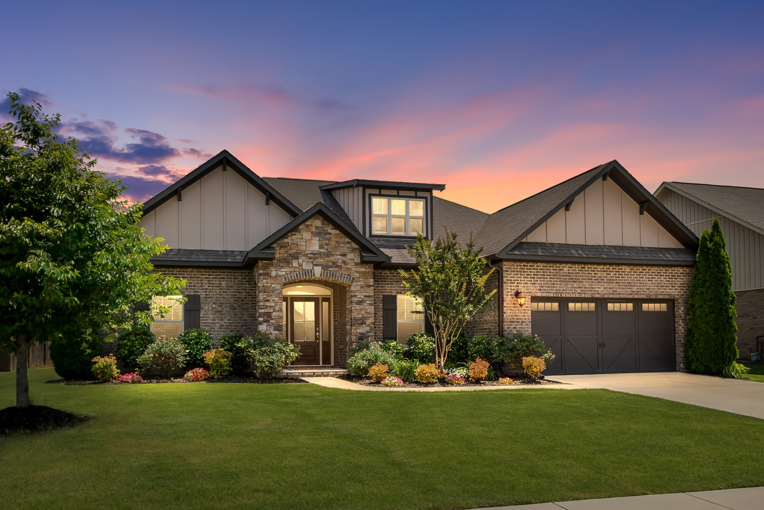 contemporary home exterior with sunset