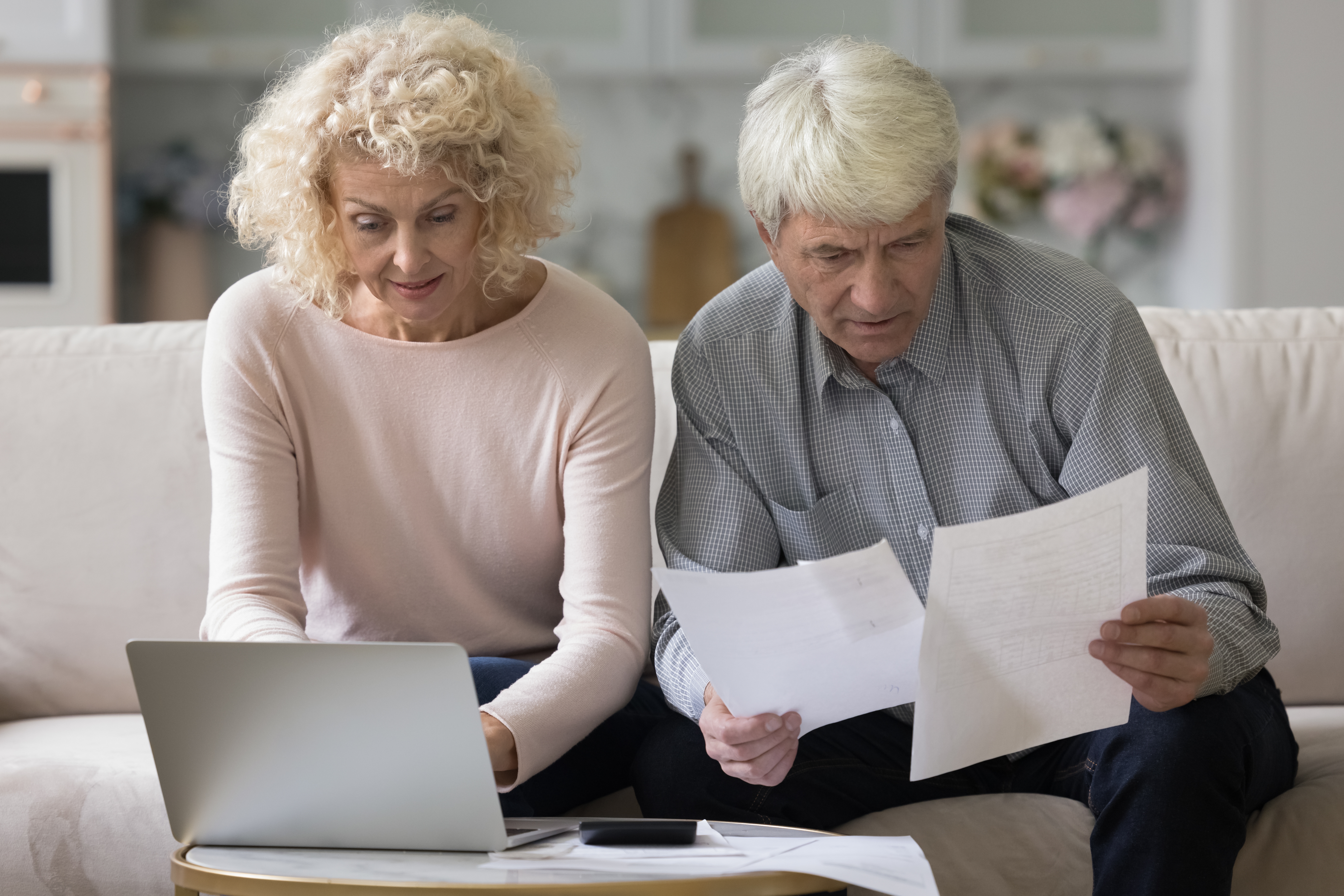 wife and husband reviewing documents
